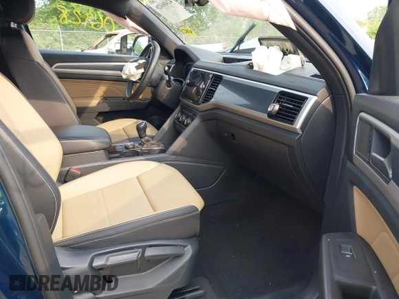 2022 Volkswagen Atlas SE z VIN 1V2KC2CA9NC216742, wystawiony jako IAAI lot #42406428 z przebiegiem 34 598 mil mil oraz . Historia ofert i sprzedaży dostępna na DreamBid. Obrazek 5.