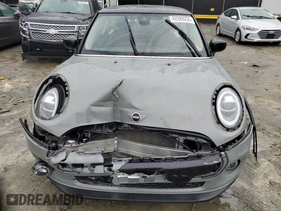 2021 MINI Hardtop Cooper with VIN WMWXR3C04M2N98103, listed as a Copart auction lot 42589255 with 61,317 mi miles and Salvage title. Bid and sale history available at DreamBid. Image 5.