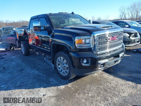 2019 GMC Sierra 2500HD Denali with VIN 1GT12SEYXKF224711, listed as a IAAI auction lot 41407508 with 77,158 mi miles. Bid and sale history available at carsss.com. Image 1.