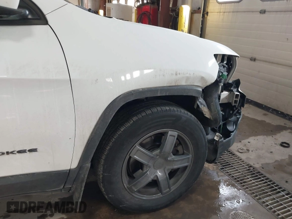 2014 Jeep Cherokee Latitude with VIN 1C4PJMCS5EW288909, listed as a IAAI auction lot 41531117 with 108,971 mi miles and . Bid and sale history available at DreamBid. Image 18.