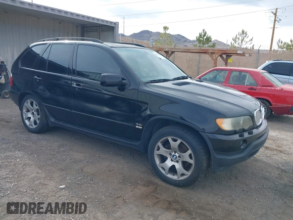 2001 BMW X5 4.4i with VIN WBAFB33531LH22723, listed as a IAAI auction lot 41834755 with 184,082 mi miles. Bid and sale history available at carsss.com. Image 1.
