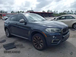 2015 BMW X6 xDrive35i with VIN 5UXKU2C59F0N76242, listed as a IAAI auction lot 41714644 with 170,851 mi miles. Bid and sale history available at carsss.com. Image 1.