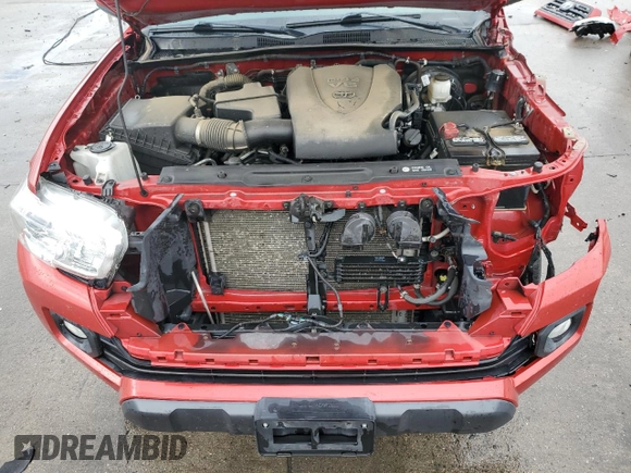 2019 Toyota Tacoma SR z VIN 3TMCZ5AN9KM215368, wystawiony jako Copart lot #66554414 z przebiegiem 84 380 mil mil oraz Szkoda całkowita • Salvage title. Historia ofert i sprzedaży dostępna na DreamBid. Obrazek 11.