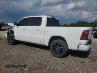 2023 Ram 1500 Limited with VIN 1C6SRFHTXPN528522, listed as a Copart auction lot 59008225 with 27,293 mi miles and Salvage title. Bid and sale history available at DreamBid. Image 2.
