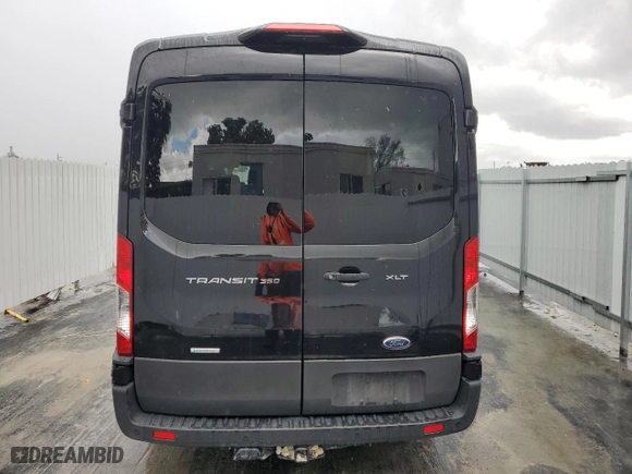 2022 Ford Transit Passenger Wagon XL with VIN 1FBAX2CG4NKA84392, listed as a Copart auction lot 71061894 with 32,083 mi miles and Clean Title. Bid and sale history available at carsss.com. Image 6.