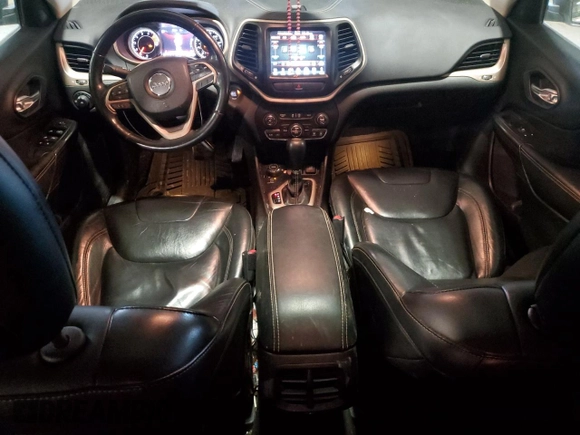 2016 Jeep Cherokee Limited z VIN 1C4PJMDS3GW130943, wystawiony jako Copart lot #46157075 z przebiegiem 152 031 mil mil oraz Szkoda całkowita • Salvage title. Historia ofert i sprzedaży dostępna na DreamBid. Obrazek 8.