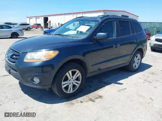 2010 Hyundai Santa Fe SE with VIN 5NMSH4AG8AH345766, listed as a IAAI auction lot 42053962 with 214,060 mi miles. Bid and sale history available at carsss.com. Image 2.