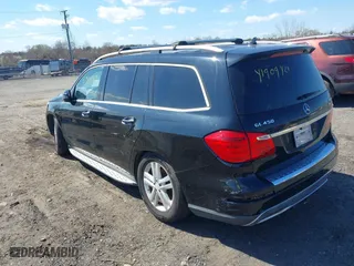 2014 Mercedes-Benz GL-Class GL 450 with VIN 4JGDF7CEXEA277610, listed as a IAAI auction lot 41909424 with 164,437 mi miles. Bid and sale history available at carsss.com. Image 3.