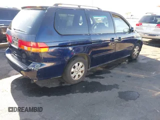 2004 Honda Odyssey EX z VIN 5FNRL18614B080980, wystawiony jako IAAI lot #41940014 z przebiegiem 233 465 mil mil oraz . Historia ofert i sprzedaży dostępna na DreamBid. Obrazek 4.