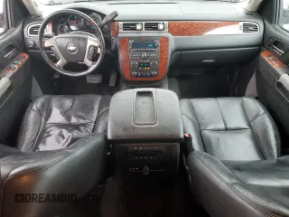 2013 Chevrolet Suburban LT with VIN 1GNSKJE77DR131188, listed as a Copart auction lot 52880375 with 147,278 mi miles and Salvage Title. Bid and sale history available at DreamBid. Image 8.