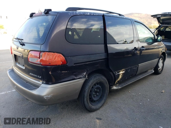 2002 Toyota Sienna LE with VIN 4T3ZF13CX2U457768, listed as a Copart auction lot 84763284 with 195,268 mi miles and Salvage Title. Bid and sale history available at DreamBid. Image 3.