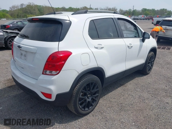 2022 Chevrolet Trax LT with VIN KL7CJPSM4NB530127, listed as a IAAI auction lot 42103923 with 34,851 mi miles and . Bid and sale history available at DreamBid. Image 4.