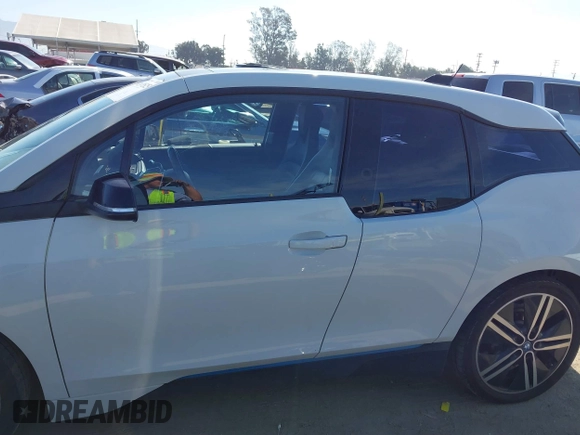 2017 BMW i3 z VIN WBY1Z8C31HV894473, wystawiony jako IAAI lot #41870525 z przebiegiem 96 414 mil mil oraz . Historia ofert i sprzedaży dostępna na DreamBid. Obrazek 14.