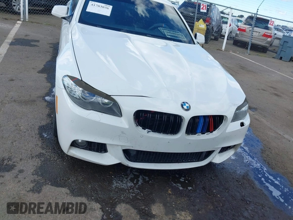 2013 BMW 5 Series 550i with VIN WBAFR9C55DDX79824, listed as a IAAI auction lot 41703036 with 107,166 mi miles and . Bid and sale history available at carsss.com. Image 6.