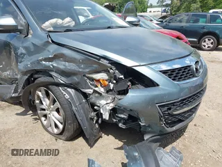 2012 Mazda CX-9 Grand Touring z VIN JM3TB2DA1C0334863, wystawiony jako IAAI lot #42157222 z przebiegiem 277 786 mil mil oraz . Historia ofert i sprzedaży dostępna na DreamBid. Obrazek 6.