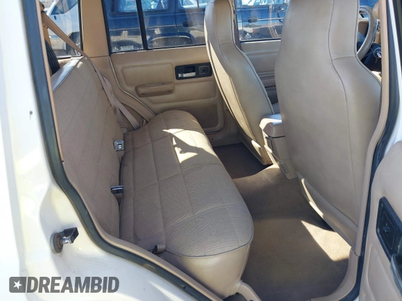 1996 Jeep Cherokee Sport with VIN 1J4FJ68S9TL234764, listed as a IAAI auction lot 41636731 with 129,732 mi miles. Bid and sale history available at carsss.com. Image 8.