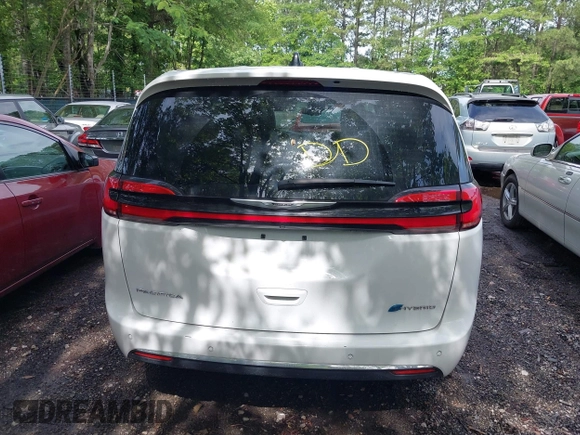 2024 Chrysler Pacifica Hybrid Select z VIN 2C4RC1S71RR118334, wystawiony jako IAAI lot #42320645 z przebiegiem 43 811 mil mil oraz . Historia ofert i sprzedaży dostępna na DreamBid. Obrazek 16.