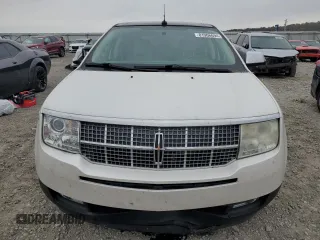 2009 Lincoln MKX with VIN 2LMDU68C79BJ12359, listed as a Copart auction lot 81906694 with 215,549 mi miles and Salvage Title. Bid and sale history available at DreamBid. Image 5.