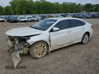 2014 Toyota Avalon Limited z VIN 4T1BK1EB5EU077882, wystawiony jako Copart lot #53579645 z przebiegiem 235 877 mil mil oraz Szkoda całkowita • Salvage title. Historia ofert i sprzedaży dostępna na DreamBid. Obrazek 1.