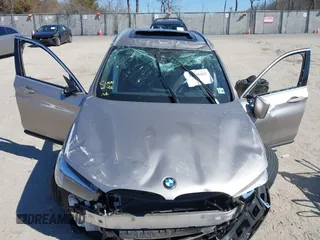 2021 BMW X1 xDrive28i with VIN WBXJG9C06M5S85511, listed as a IAAI auction lot 41705422 with 30,636 mi miles. Bid and sale history available at carsss.com. Image 6.