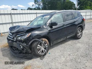 2016 Honda Pilot EX-L with VIN 5FNYF6H58GB101089, listed as a Copart auction lot 61691125 with 263,134 mi miles and Salvage title. Bid and sale history available at DreamBid. Image 1.
