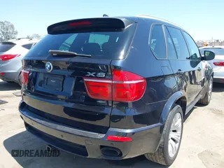 2013 BMW X5 xDrive50i with VIN 5UXZV8C5XD0C15908, listed as a IAAI auction lot 42536233 with 190,627 mi miles and . Bid and sale history available at DreamBid. Image 4.