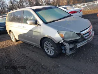 2007 Honda Odyssey Touring with VIN 5FNRL38817B045910, listed as a IAAI auction lot 41770912 with 999,999 mi miles. Bid and sale history available at carsss.com. Image 1.