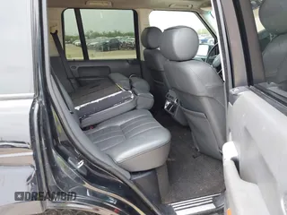 2006 Land Rover Range Rover HSE with VIN SALME15486A235049, listed as a IAAI auction lot 41948648 with 211,154 mi miles. Bid and sale history available at carsss.com. Image 8.