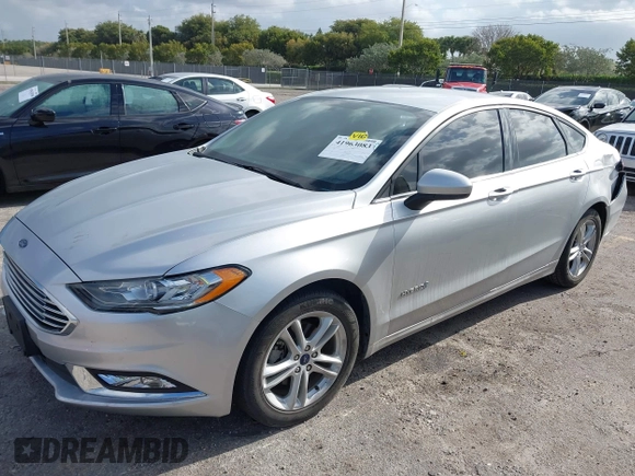 2018 Ford Fusion SE z VIN 3FA6P0LU2JR281231, wystawiony jako IAAI lot #41963083 z przebiegiem 115 434 mil mil oraz . Historia ofert i sprzedaży dostępna na DreamBid. Obrazek 2.