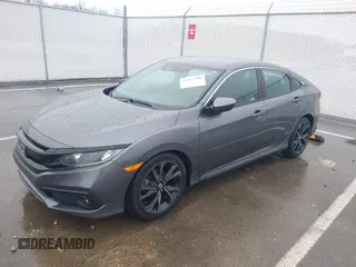 2021 Honda Civic Sedan Sport with VIN 2HGFC2F87MH548249, listed as a IAAI auction lot 41471400 with 79,553 mi miles. Bid and sale history available at carsss.com. Image 2.
