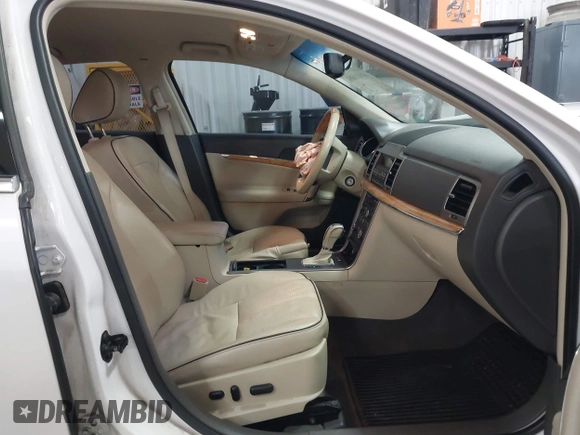 2011 Lincoln MKZ with VIN 3LNHL2GC9BR761467, listed as a IAAI auction lot 41939881 with 137,881 mi miles and . Bid and sale history available at DreamBid. Image 5.