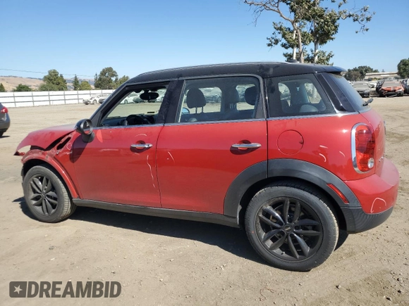 2014 MINI Countryman with VIN WMWZB3C5XEWR42035, listed as a Copart auction lot 61846725 with 105,131 mi miles and Salvage title. Bid and sale history available at DreamBid. Image 2.