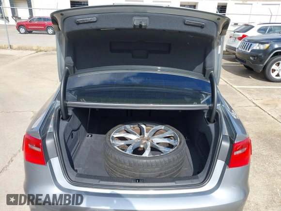 2013 Audi A6 3.0T Prestige with VIN WAUHGAFC4DN126258, listed as a IAAI auction lot 41512291 with 123,298 mi miles. Bid and sale history available at carsss.com. Image 12.