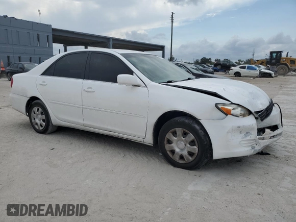 2004 Toyota Camry LE with VIN 4T1BE32K14U285392, listed as a Copart auction lot 48312415 with 121,629 mi miles and Salvage Title. Bid and sale history available at DreamBid. Image 4.