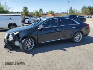 2014 Cadillac XTS Premium z VIN 2G61P5S3XE9238362, wystawiony jako Copart lot #52135695 z przebiegiem 122 428 mil mil oraz Szkoda całkowita • Salvage title. Historia ofert i sprzedaży dostępna na DreamBid. Obrazek 1.