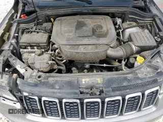 2021 Jeep Grand Cherokee Laredo X z VIN 1C4RJEAG2MC681229, wystawiony jako Copart lot #57771765 z przebiegiem 110 671 mil mil oraz Szkoda całkowita • Salvage title. Historia ofert i sprzedaży dostępna na DreamBid. Obrazek 11.