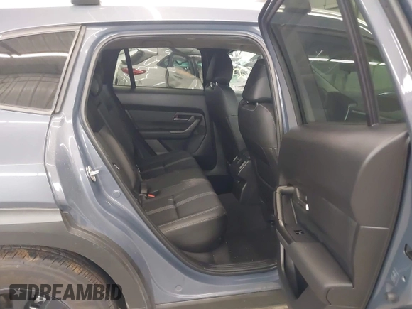 2023 Mazda CX-50 S Preferred Plus with VIN 7MMVABCM7PN154716, listed as a IAAI auction lot 42298522 with 19,073 mi miles and . Bid and sale history available at DreamBid. Image 8.