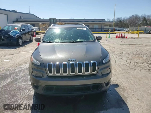 2015 Jeep Cherokee Latitude with VIN 1C4PJLCS0FW707387, listed as a Copart auction lot 48953465 with 140,965 mi miles and Salvage Title. Bid and sale history available at carsss.com. Image 14.