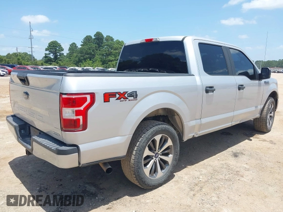 2019 Ford F-150 XL with VIN 1FTEW1EP5KKD24620, listed as a IAAI auction lot 42631896 with 123,583 mi miles and . Bid and sale history available at DreamBid. Image 4.
