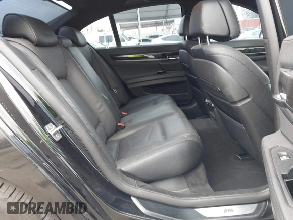 2015 BMW 7 Series 740i with VIN WBAYA6C54FG273188, listed as a IAAI auction lot 42563572 with 70,675 mi miles and . Bid and sale history available at DreamBid. Image 8.