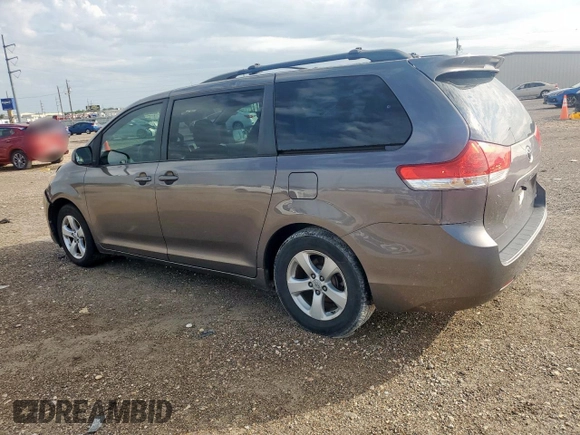 2011 Toyota Sienna LE AAS with VIN 5TDKK3DC7BS171627, listed as a Copart auction lot 64001605 with 130,748 mi miles and Salvage title. Bid and sale history available at DreamBid. Image 2.