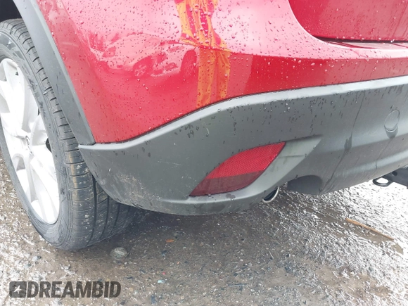 2015 Mazda CX-5 Grand Touring with VIN JM3KE4DY0F0479392, listed as a IAAI auction lot 41659415 with 141,403 mi miles. Bid and sale history available at carsss.com. Image 6.