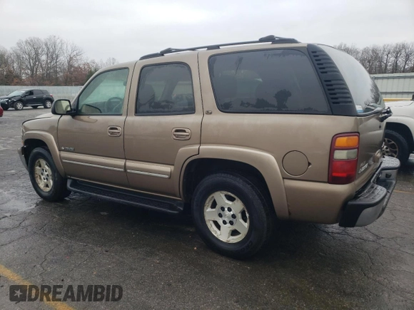 2003 Chevrolet Tahoe LS with VIN 1GNEC13Z33J329603, listed as a Copart auction lot 83828254 with 193,849 mi miles and Salvage Title. Bid and sale history available at carsss.com. Image 2.