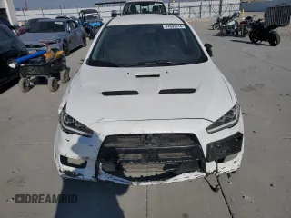 2015 Mitsubishi Lancer Evolution GSR with VIN JA32W8FV4FU024603, listed as a Copart auction lot 74699914 with 81,311 mi miles and Salvage Title. Bid and sale history available at carsss.com. Image 5.