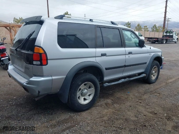 2004 Mitsubishi Montero Sport LS with VIN JA4MT21R24J003641, listed as a IAAI auction lot 41809144 with 223,449 mi miles. Bid and sale history available at carsss.com. Image 4.