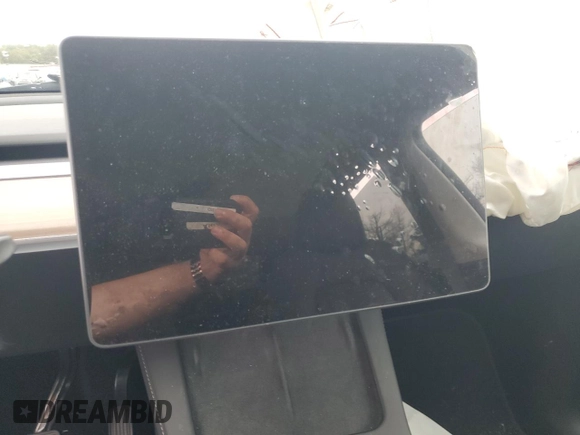 2024 Tesla Model Y Long Range с VIN 7SAYGDEE7RF180945, выставлен на аукционе Copart как лот 62059735 с пробегом Не указан миль и Списание • Salvage title. История ставок и продаж доступна на DreamBid. Изображение 9.