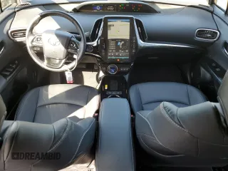 2021 Toyota Prius LE with VIN JTDKAMFP7M3185847, listed as a Copart auction lot 52897465 with 58,996 mi miles and Salvage Title. Bid and sale history available at DreamBid. Image 8.