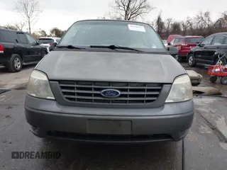 2005 Ford Freestar SE z VIN 2FMZA51625BA54311, wystawiony jako IAAI lot #41120117 z przebiegiem 139 647 mil mil oraz . Historia ofert i sprzedaży dostępna na DreamBid. Obrazek 13.