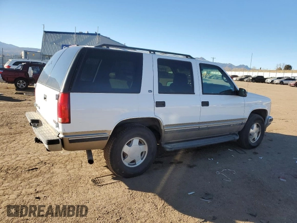 1999 GMC Denali z VIN 1GKEK13R5XR503159, wystawiony jako Copart lot #89018655 z przebiegiem 229 819 mil mil oraz Czysty tytuł • Clean title. Historia ofert i sprzedaży dostępna na DreamBid. Obrazek 3.