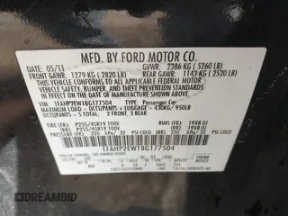 2011 Ford Taurus SEL with VIN 1FAHP2EW1BG177504, listed as a IAAI auction lot 41578564 with 243,855 mi miles. Bid and sale history available at carsss.com. Image 9.